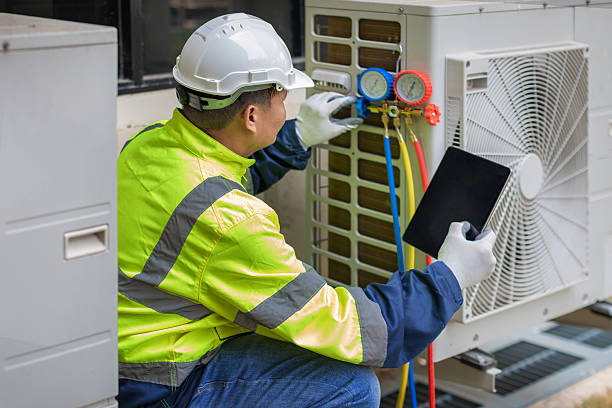 Professional Emergency Ac Repair technician working in Orange City, IA